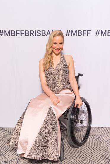From Australia to all the world... Masrawy interviews the first fashion designer affected by quadriplegia